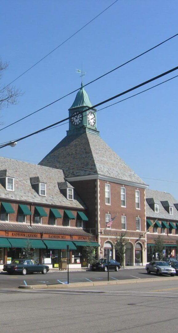 Historic Radburn building with a clock tower in Fair Lawn